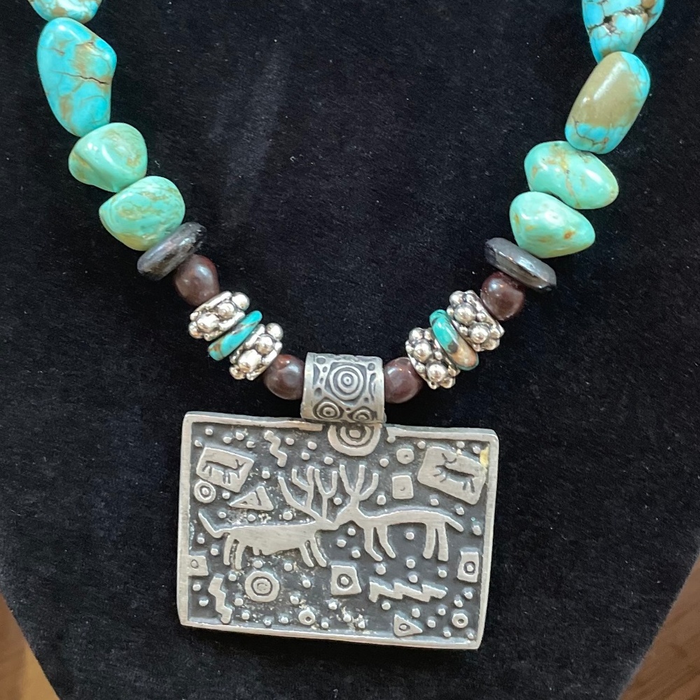 Striking turquoise and pewter beaded with Southwest pewter petroglyph pendant